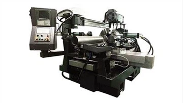 Stroj na spriadanie rúr/rúrok